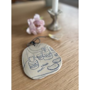 Keramik oph�ng med hverdags illustration. Nr. 1